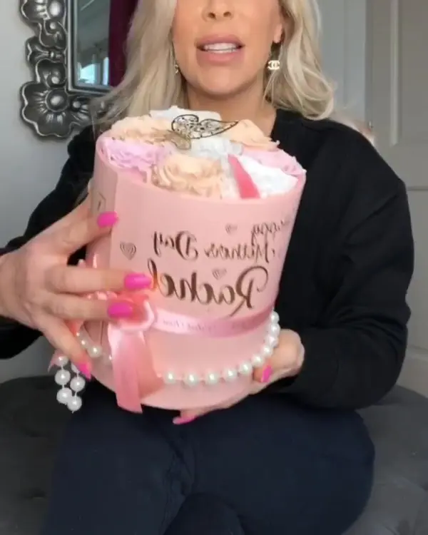 Rachel Lugo holding her personalised Velvet Rose Mother's Day box